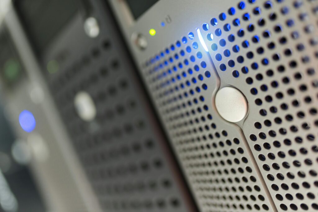 pexels-photo-17489156-17489156 Focused detail of a modern server rack with blue LED indicators in a data center.